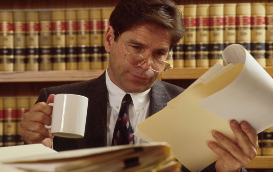A man researching legal documents