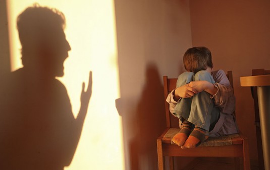 parent yelling at a scared child